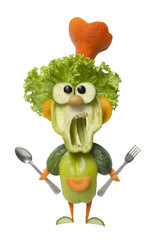 Funny vegetable cook with fork and spoon © serg78