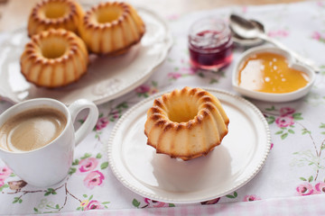 Breakfast with muffins, coffee and honey