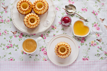 Breakfast with muffins, coffee and honey