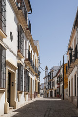 Fototapeta na wymiar Paseando por la ciudad del Tajo de Ronda en la provincia de Málaga, Andalucía