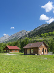 Wooden cottages in the Alps