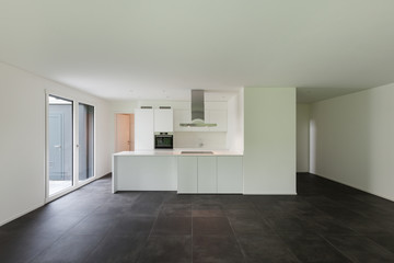 interior of empty apartment, wide room with kitchen