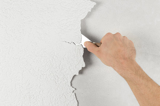 plaster removal with scraper