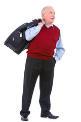 Fototapeta premium Happy and smile old senior man holding suitcase on shoulder and put hand in trouser pocket looking at right, isolated on white background. Positive human emotion, facial expression