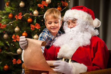 Santa Claus and a little boy