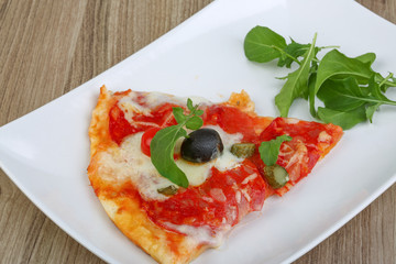 Pizza with salami and mozzarella