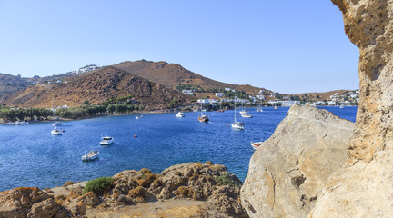 Fototapeta na wymiar The Greek island of Patmos in the Aegean Sea - the bay of Grikos. Grikos bay is situated in the southeast 4.5 km from the port in Skala 