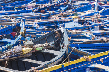 Blue fishing boats in Essaouira port, Morocco