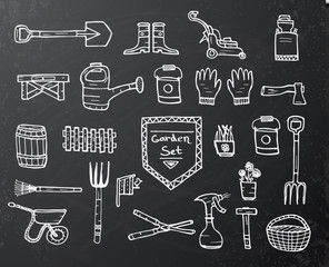 Collection of garden elements on black chalkboard