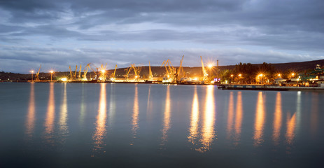 Obraz premium Sea port of Feodosia in evening .