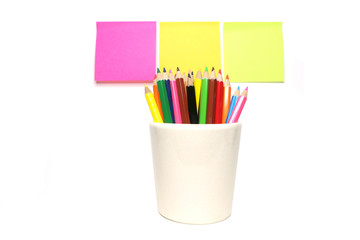 color pencil with post it in white background