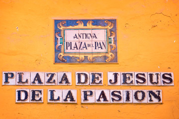Street name on ceramic tiles in Sevilla, Andalusia, Spain