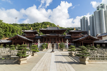 Temple hall and Chinese garden at the Chi Lin Nunnery in Hong Kong, China. Traditional Chinese architecture in Tang Dynasty style.