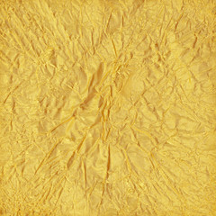 Shiny yellow leaf gold foil texture background