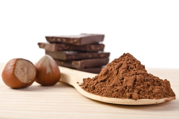 the tower from chocolate with nuts  and cacao powder in the wood