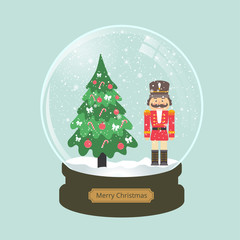 christmas snow globe with nutcracker and fir-tree