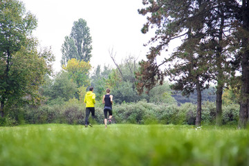 Young people running in the park