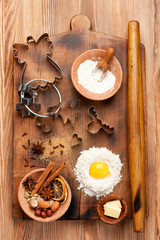 Christmas baking ingredients. Flour, eggs, butter and spices