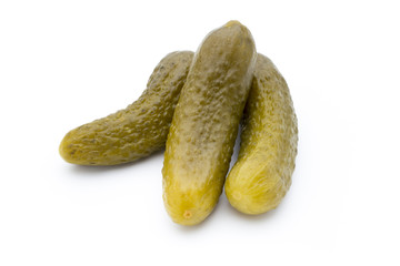 Pickled cucumbers isolated on white background.