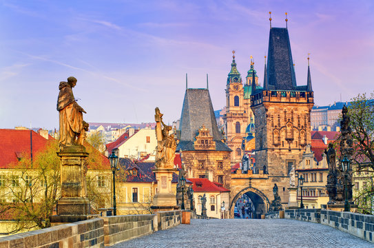 Charles Bridge and the towers of the old town of Prague on sunrise, Czech Republic