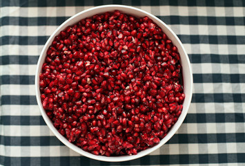 pomegranate seeds on a table