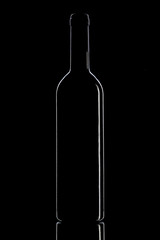 Wine bottle on a black background