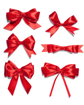 set of six red ribbon satin bows