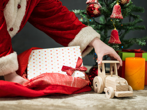 holidays, celebration and people concept - close up of santa cla