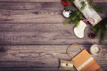 Christmas background on wooden table and copy space, shopping bag