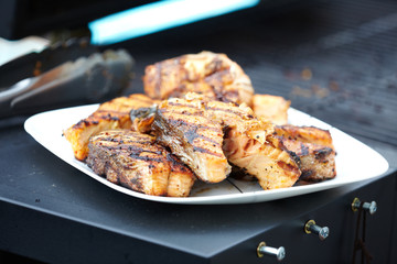 Salmon fish roast on barbecue grill.