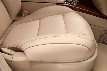 Front leather seat of car. Business auto interior detail.