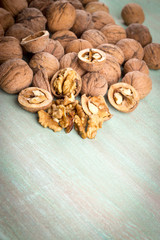 Walnuts whole in their skins, chopped, nut hulls, walnut kernels