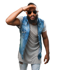 Fototapeta premium black man looking far on white