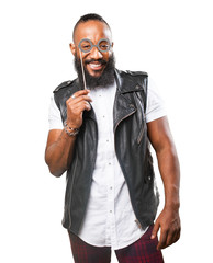 black man having fun with party accessories