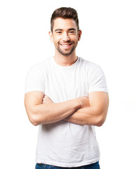 Obraz premium young man crossing arms