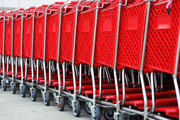 red shopping carts in row