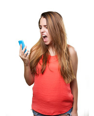 angry young woman shouting to mobile on white background