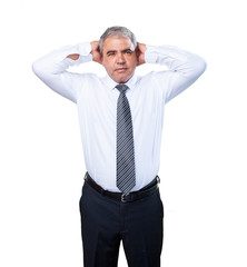 busines man covering his ears