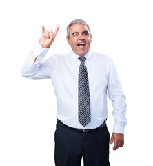 mature man doing a rock gesture