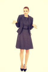 Undecided blond business woman.