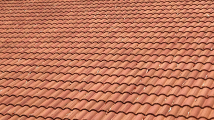 brown tile roof weathered on building residential