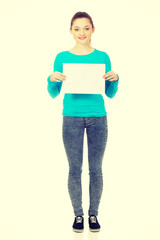 Happy woman with blank board.