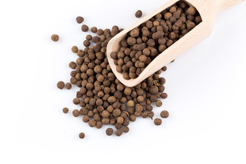 Wooden shovel with black peppercorn