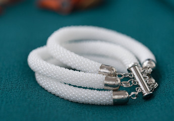 Handmade bracelet from a small white beads