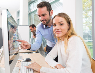 Fototapeta premium Young attractive people taking a training course with formator