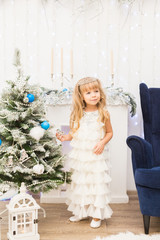 Little girl in christmas decorations