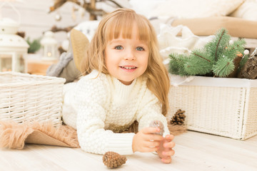 Fototapeta premium Little girl in christmas decorations