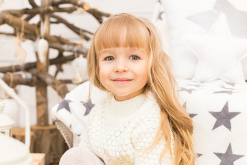 Little girl in christmas decorations