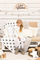 Little girl in christmas decorations