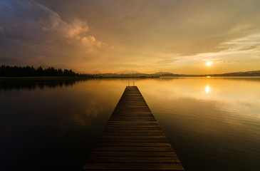 Fototapeta na wymiar Sunset at the beautifull Lake Hopfensee in Germany.